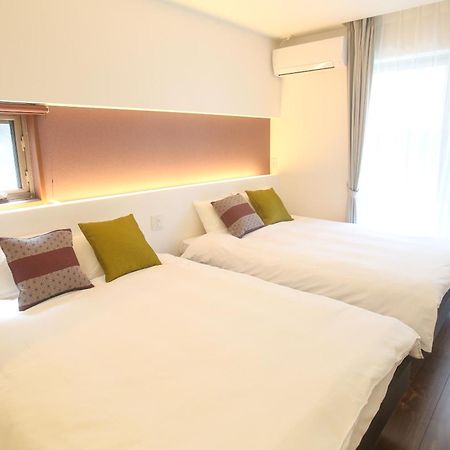 Apartment Hotel Tenjin TUMUGU Fukuoka  Bagian luar foto