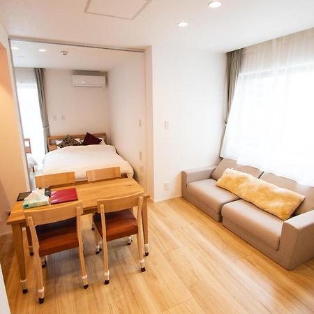 Apartment Hotel Tenjin TUMUGU Fukuoka  Bagian luar foto