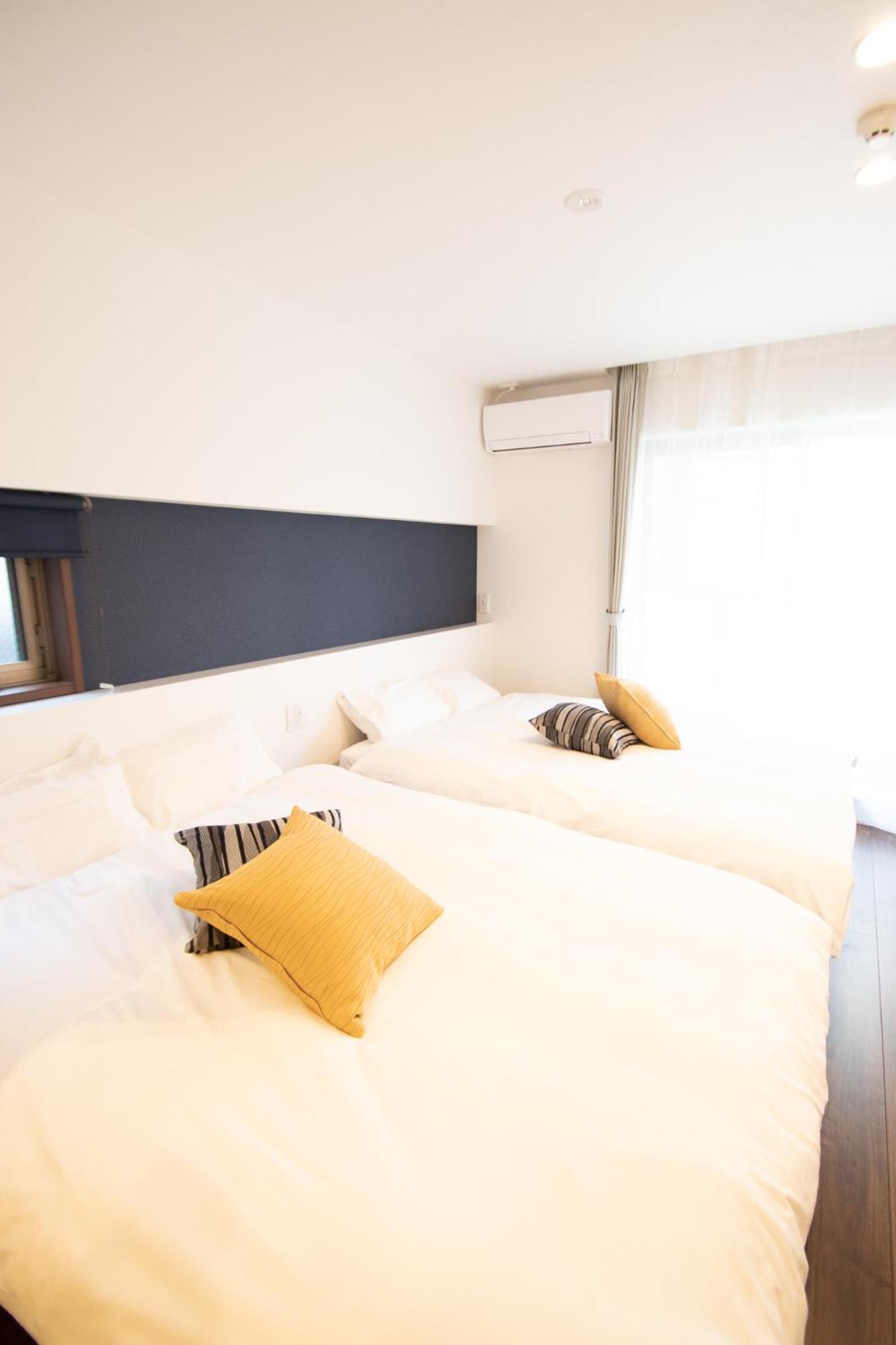 Apartment Hotel Tenjin TUMUGU Fukuoka  Bagian luar foto