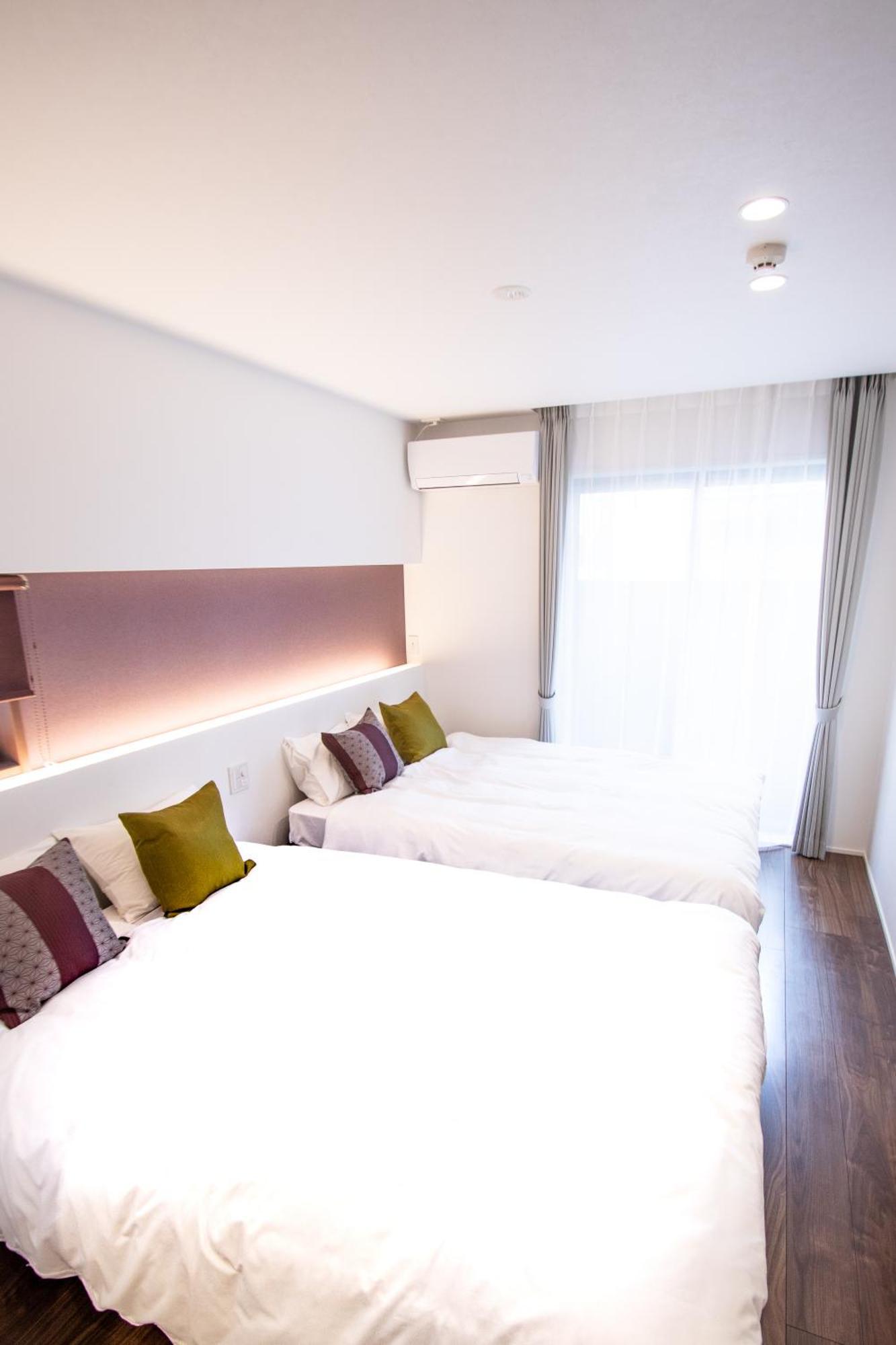Apartment Hotel Tenjin TUMUGU Fukuoka  Bagian luar foto