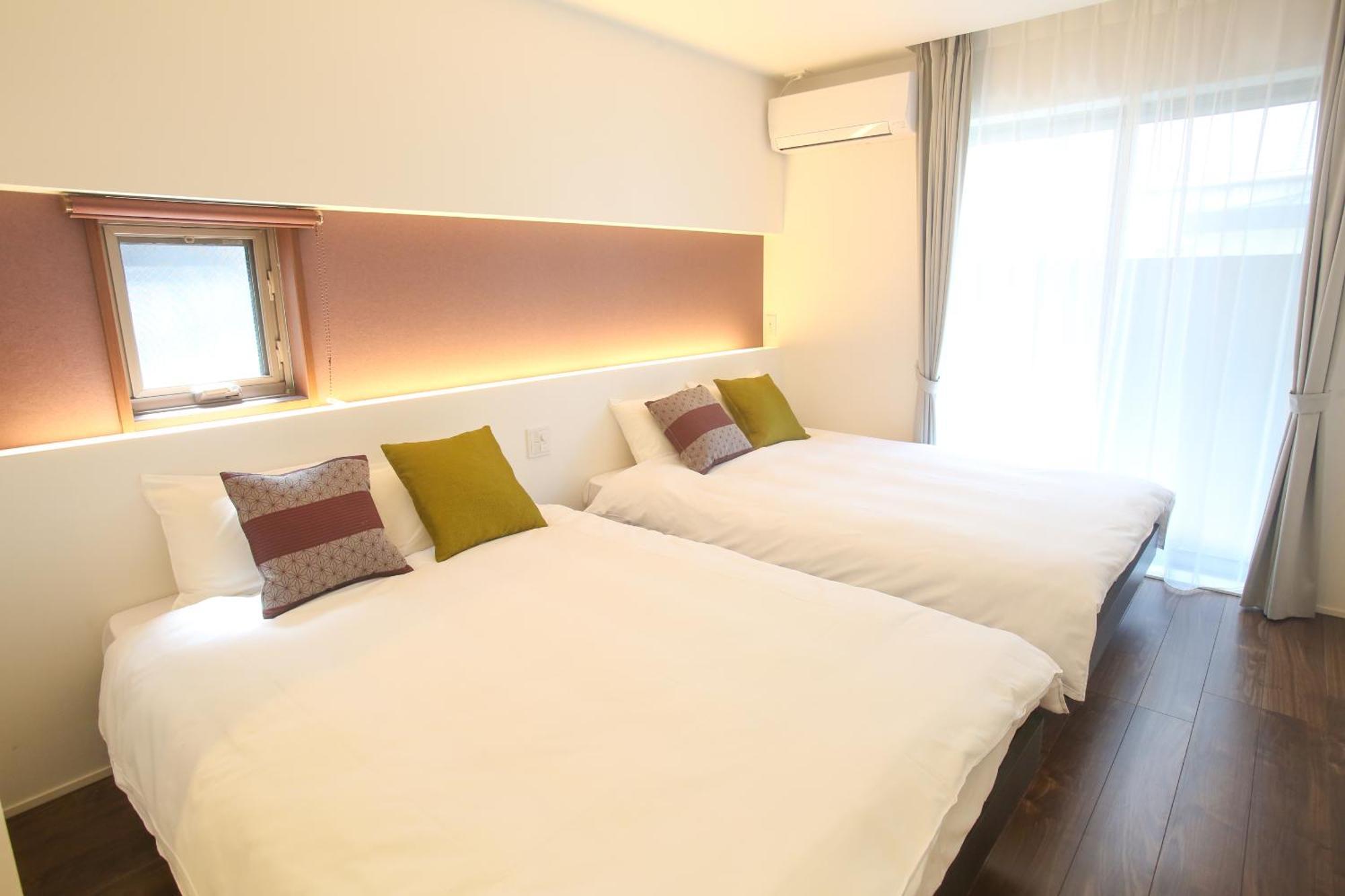 Apartment Hotel Tenjin TUMUGU Fukuoka  Bagian luar foto