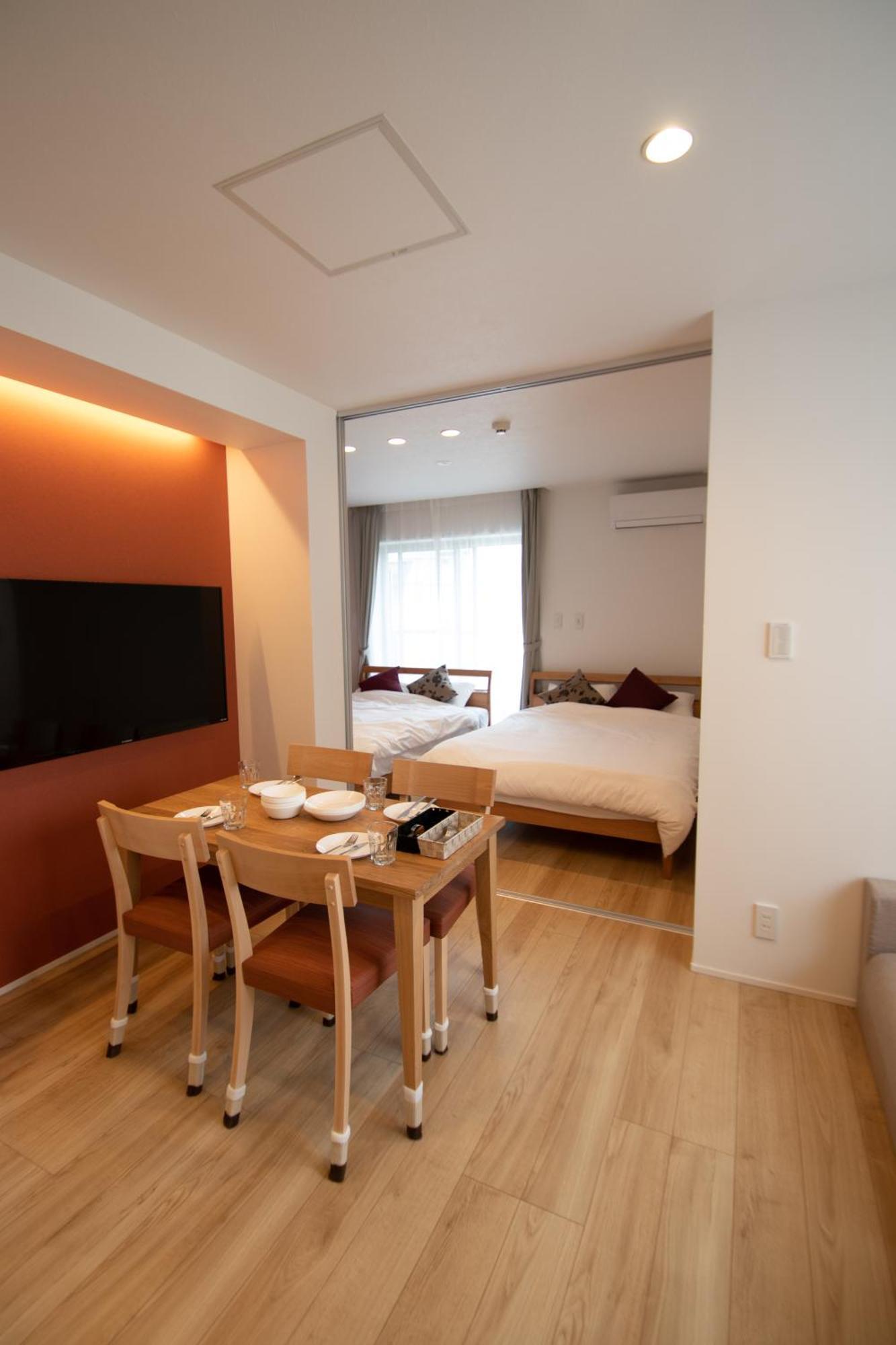 Apartment Hotel Tenjin TUMUGU Fukuoka  Bagian luar foto