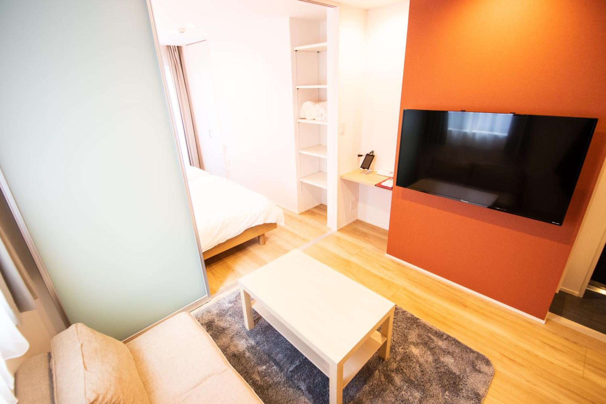 Apartment Hotel Tenjin TUMUGU Fukuoka  Bagian luar foto