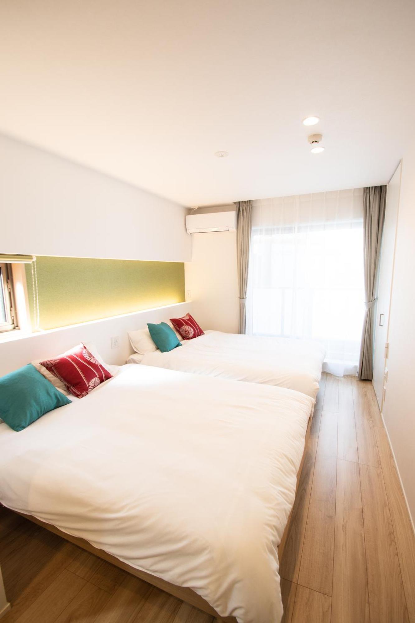 Apartment Hotel Tenjin TUMUGU Fukuoka  Bagian luar foto