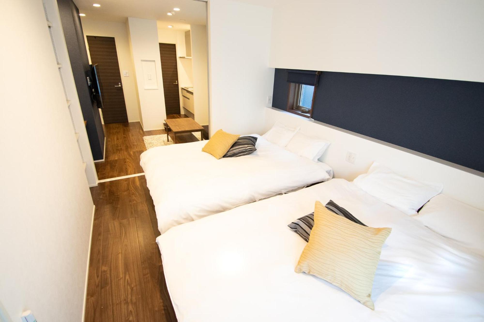 Apartment Hotel Tenjin TUMUGU Fukuoka  Bagian luar foto