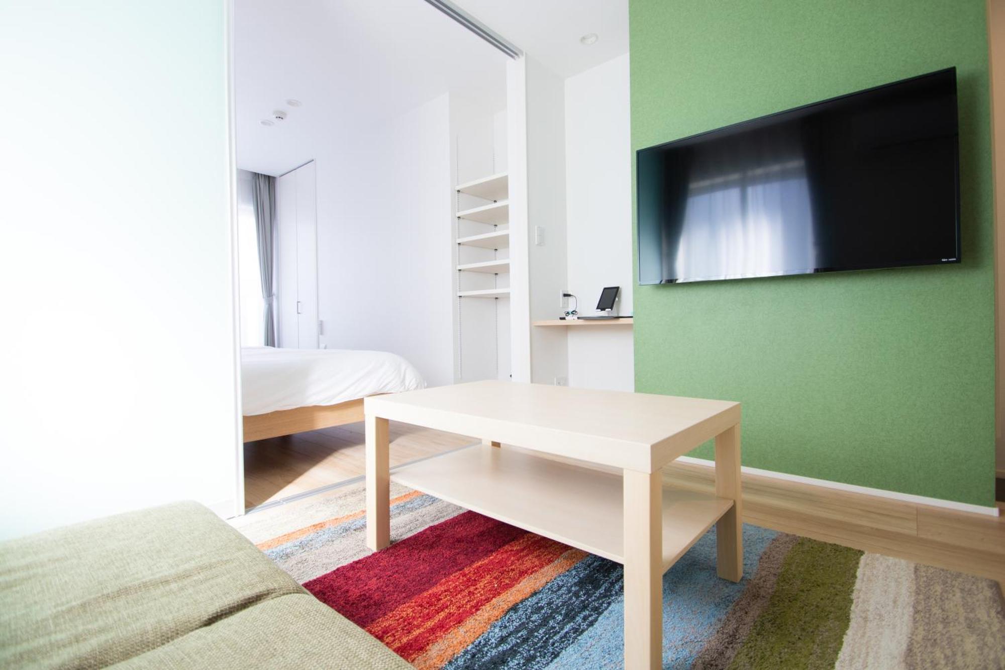Apartment Hotel Tenjin TUMUGU Fukuoka  Bagian luar foto