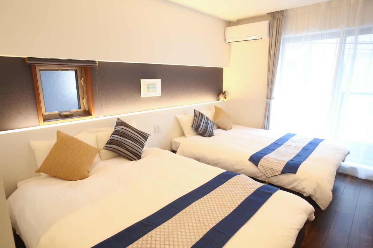 Apartment Hotel Tenjin TUMUGU Fukuoka  Bagian luar foto