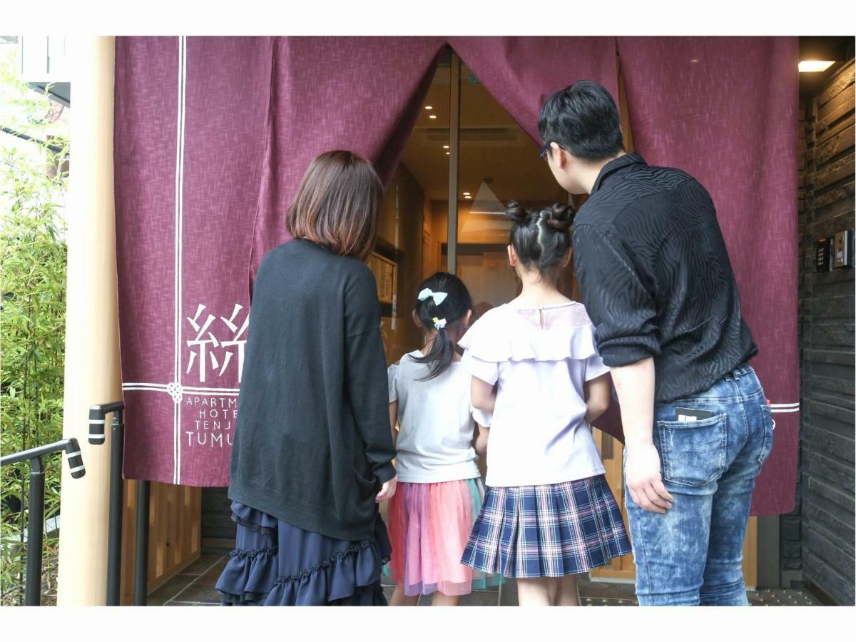 Apartment Hotel Tenjin TUMUGU Fukuoka  Bagian luar foto